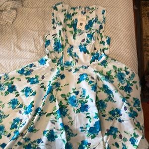 Fit and flare dress with a full circle skirt, never worn